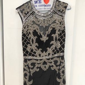 Black formal sleeveless open back gown